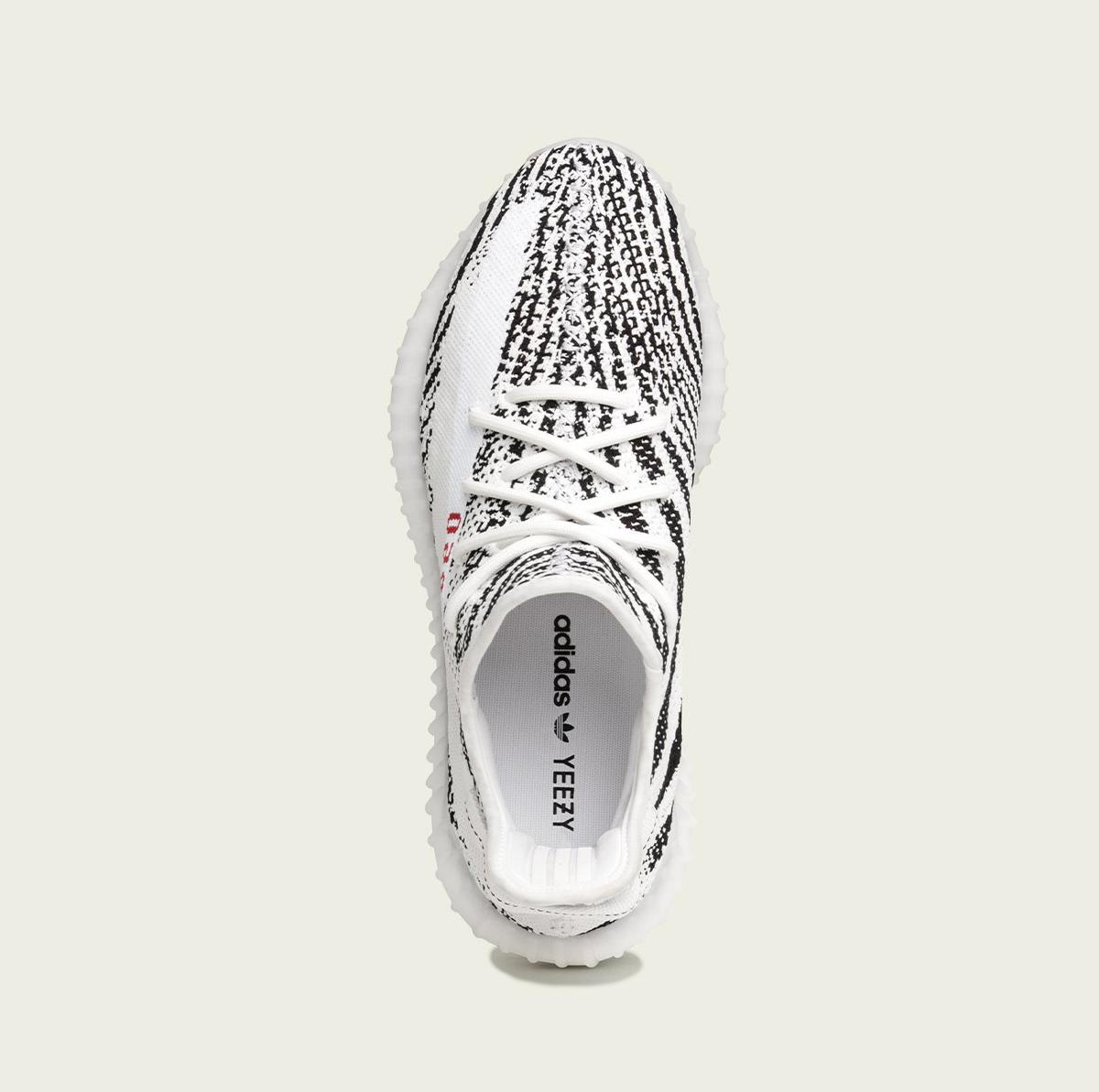 White and black yeezy on sale shoes